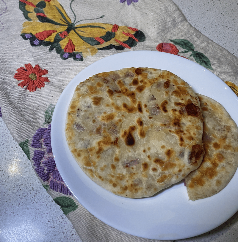 Fresh parathas made from an online cooking class date